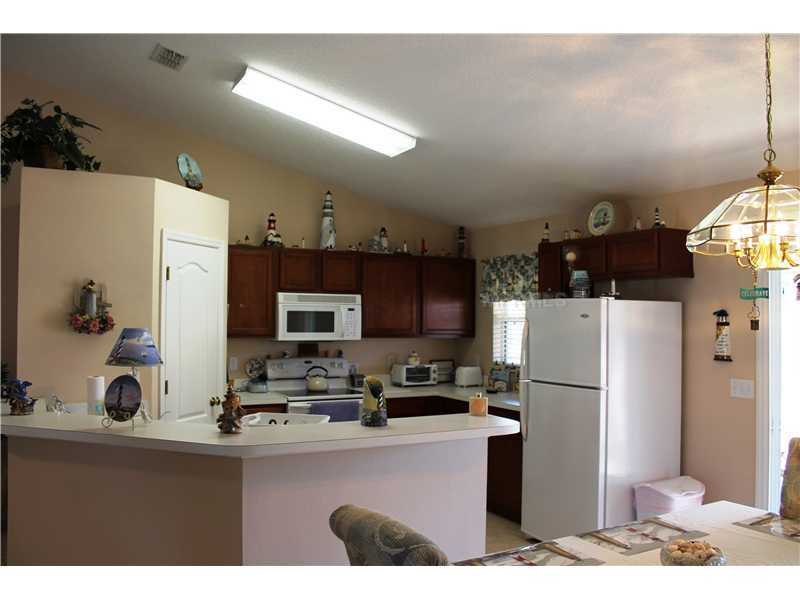 Property Photo:  713 Gentle Breeze Drive  FL 34715 