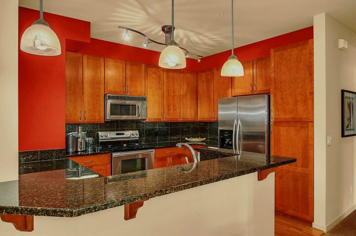 Property Photo:  150 102nd Ave SE 210  WA 98004 