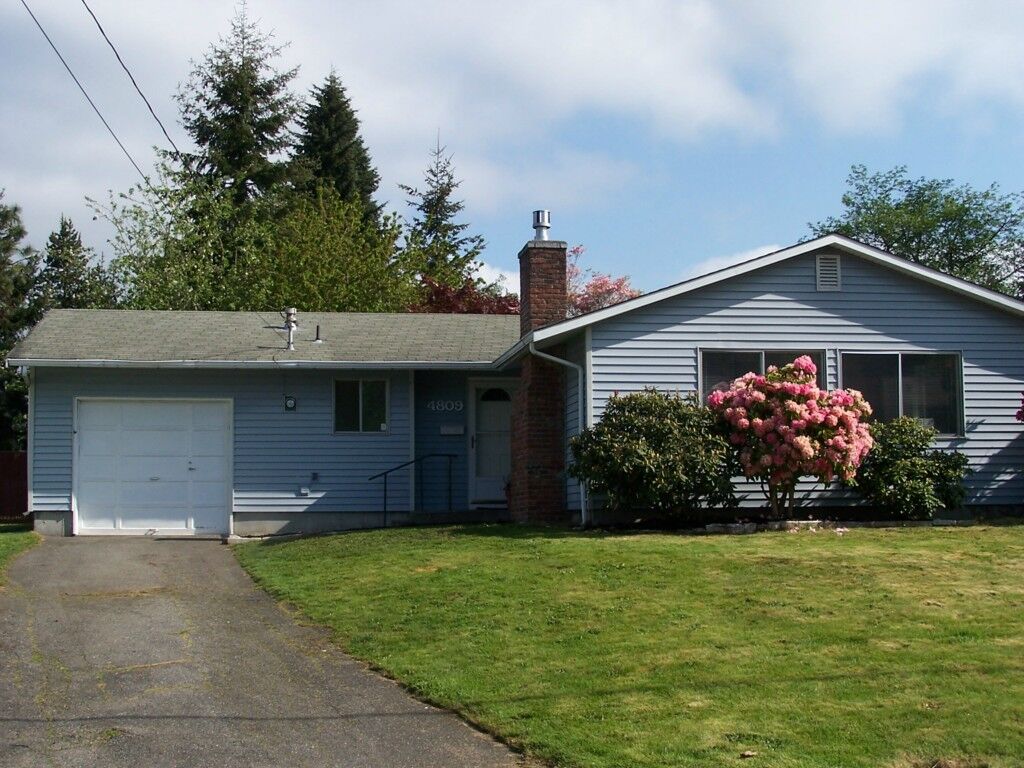 Property Photo:  4809 219th St SW  WA 98043 