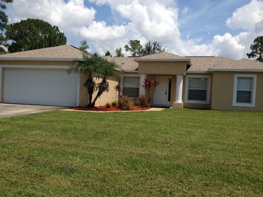 Property Photo:  2041 SW Fears Avenue  FL 34953 