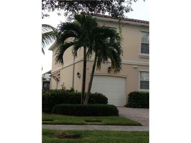 Property Photo: 114 Santa Barbara Way FL 33410