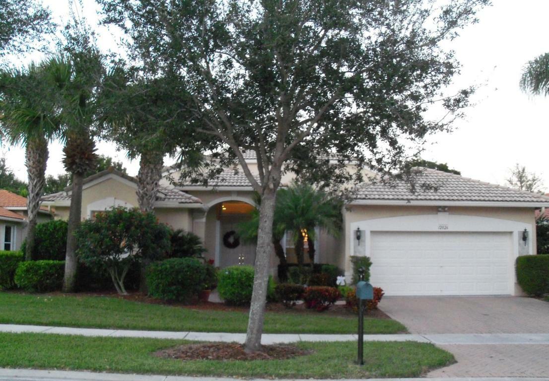 Property Photo:  12026 Oakvista Drive  FL 33437 