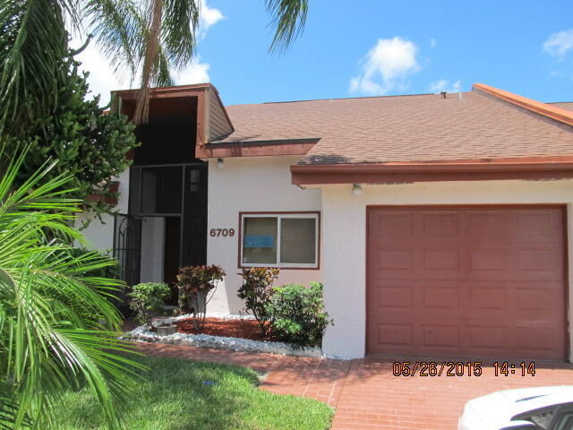 Property Photo:  6709 Versailles Court  FL 33467 