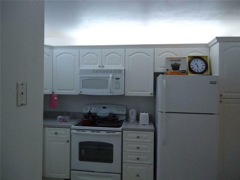 Property Photo:  9300 N Hollybrook Lake Dr 7-203  FL 33025 