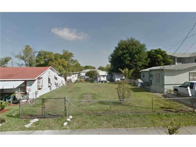 Property Photo: 301 NW 8th St FL 33009