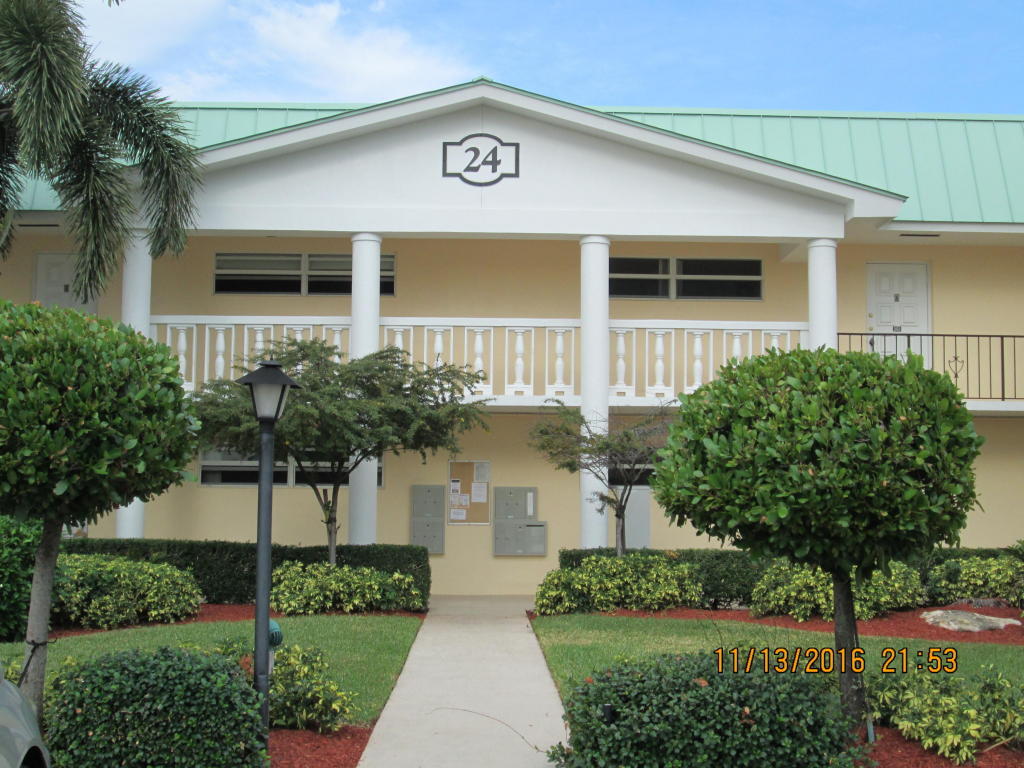 Property Photo: 24 Colonial Club Drive 200 FL 33435