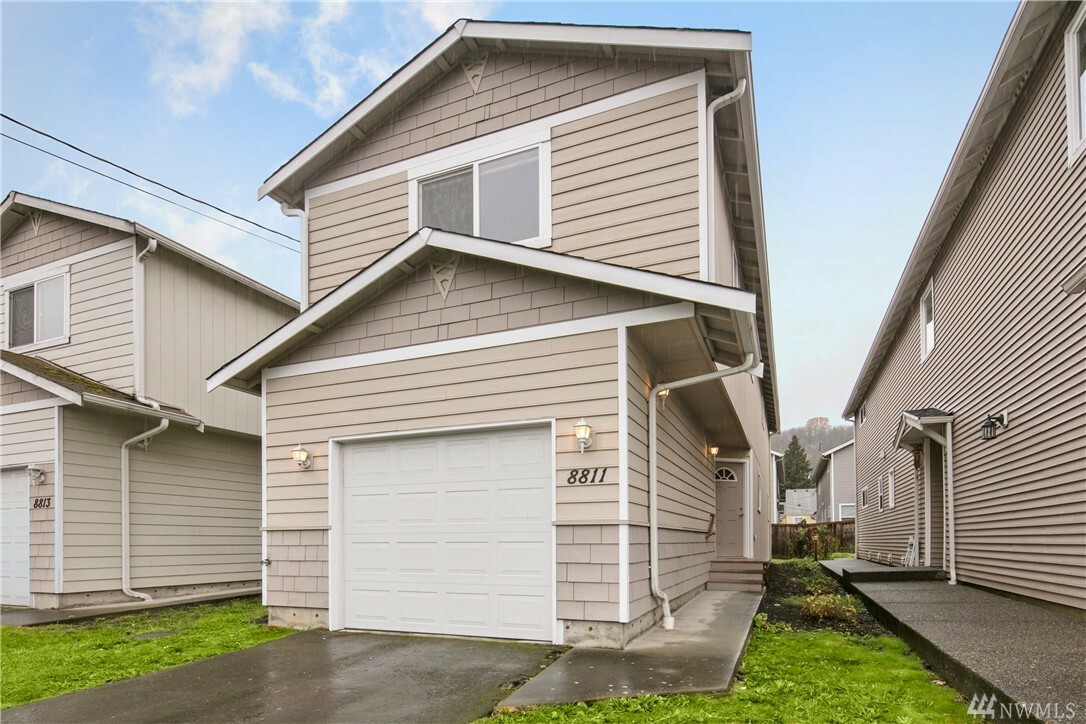 Property Photo:  8811 4th Ave S  WA 98108 