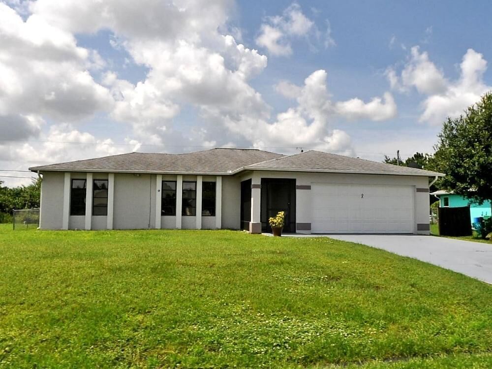 Property Photo:  1014 SW Goodman Avenue  FL 34953 