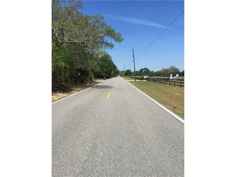 Property Photo:  Old Mims Road  FL 32732 