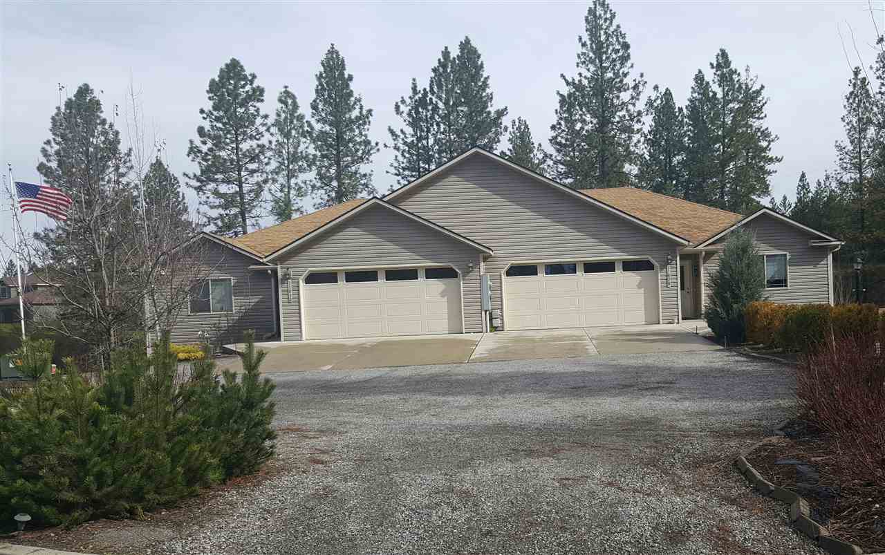 Property Photo:  11828 N Bedivere  WA 99218-1706 