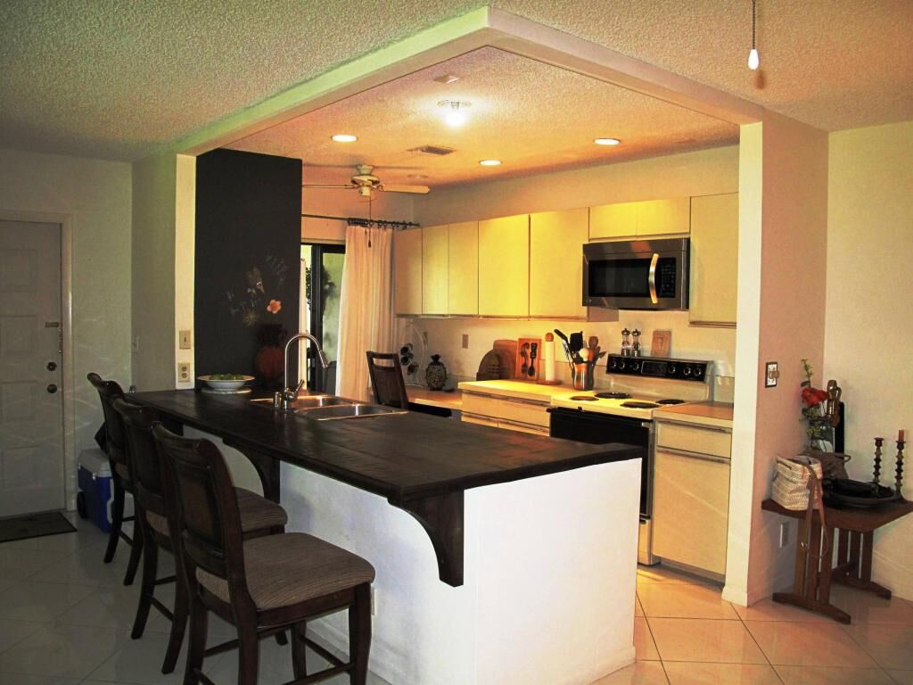 Property Photo:  5031 Nesting Way D  FL 33484 