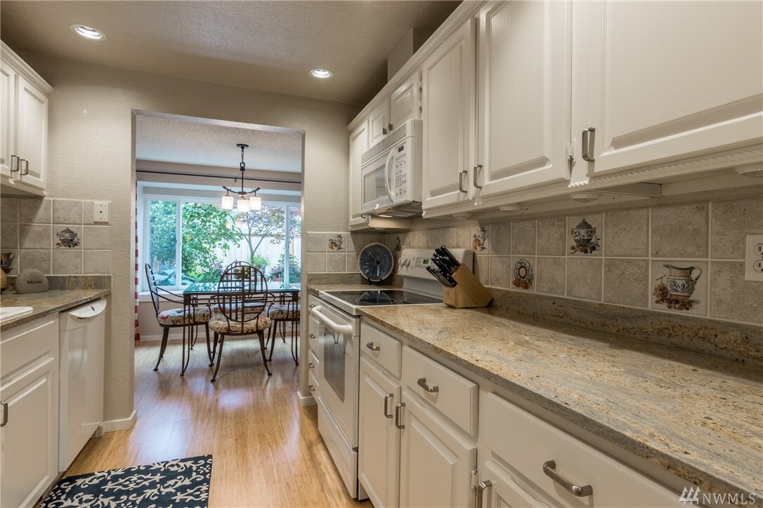 Property Photo: 8414 240th St SW B-104 WA 98026
