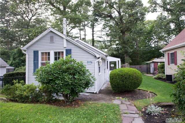 Property Photo:  46 Breezy Point Road  NY 11792 