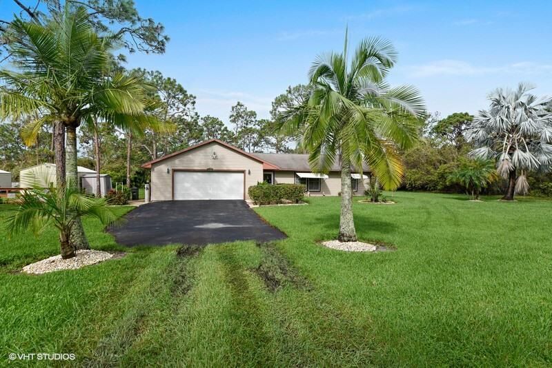 Property Photo:  16867 130th Way N  FL 33478 