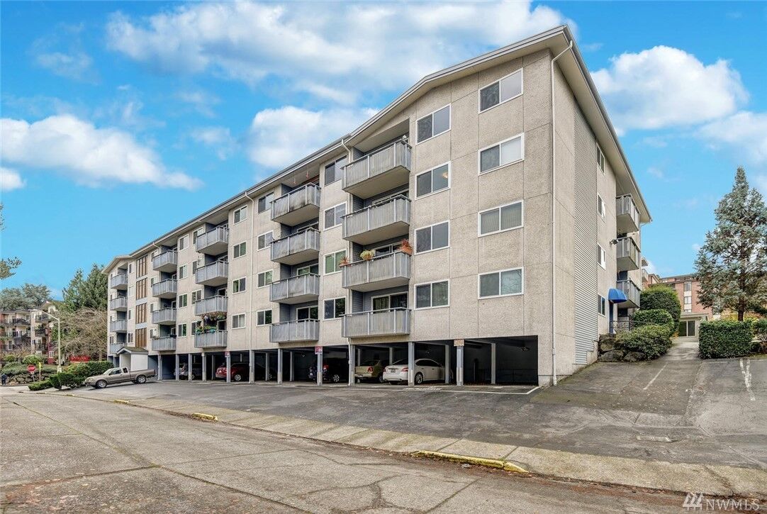 Property Photo:  3711 26th Place W 405  WA 98199 