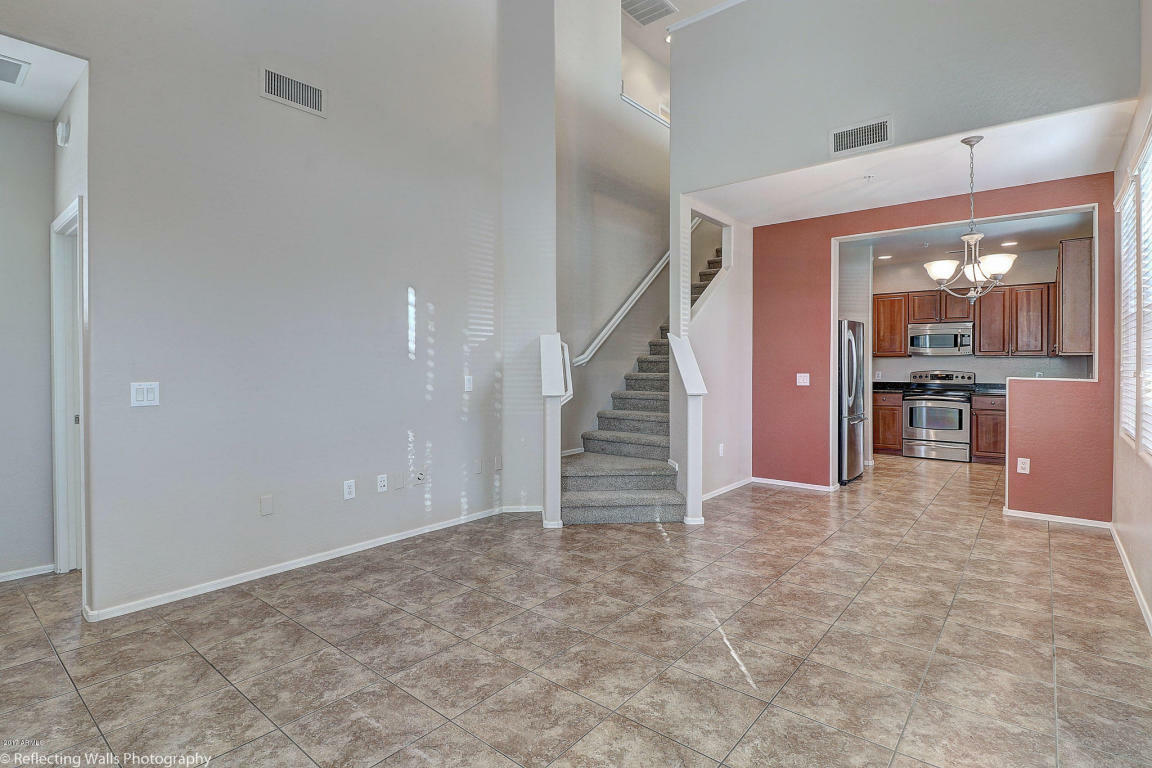 Property Photo:  14870 W Encanto Boulevard 1035  AZ 85395 