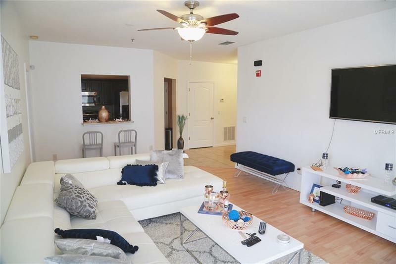 Property Photo:  4833 Cypress Woods Drive 4311  FL 32811 