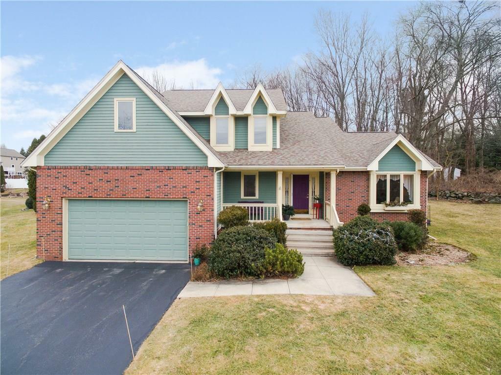 Property Photo: 1 Windsong Rd RI 02864