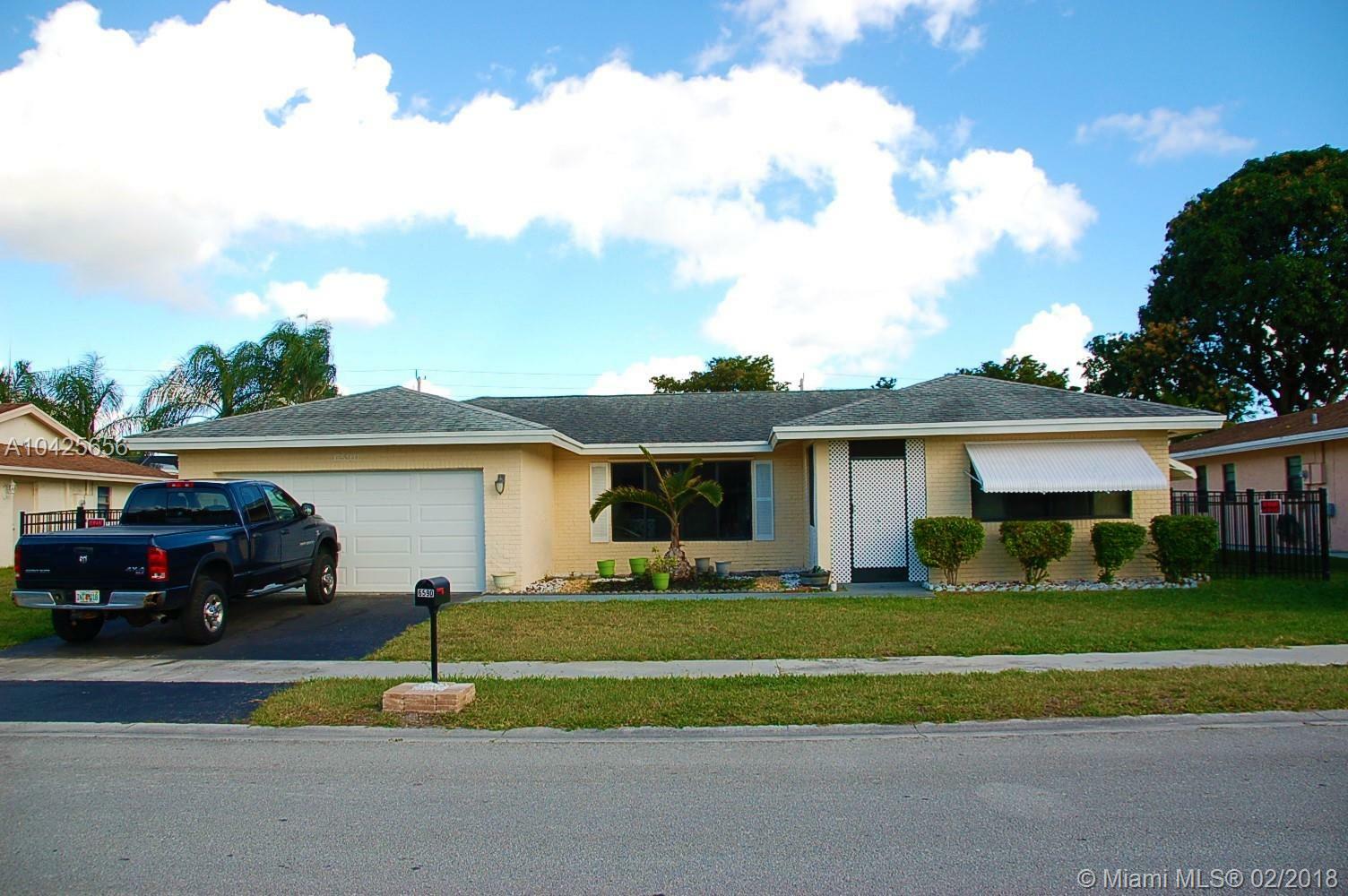 Property Photo:  6590 NW 89th Ave  FL 33321 