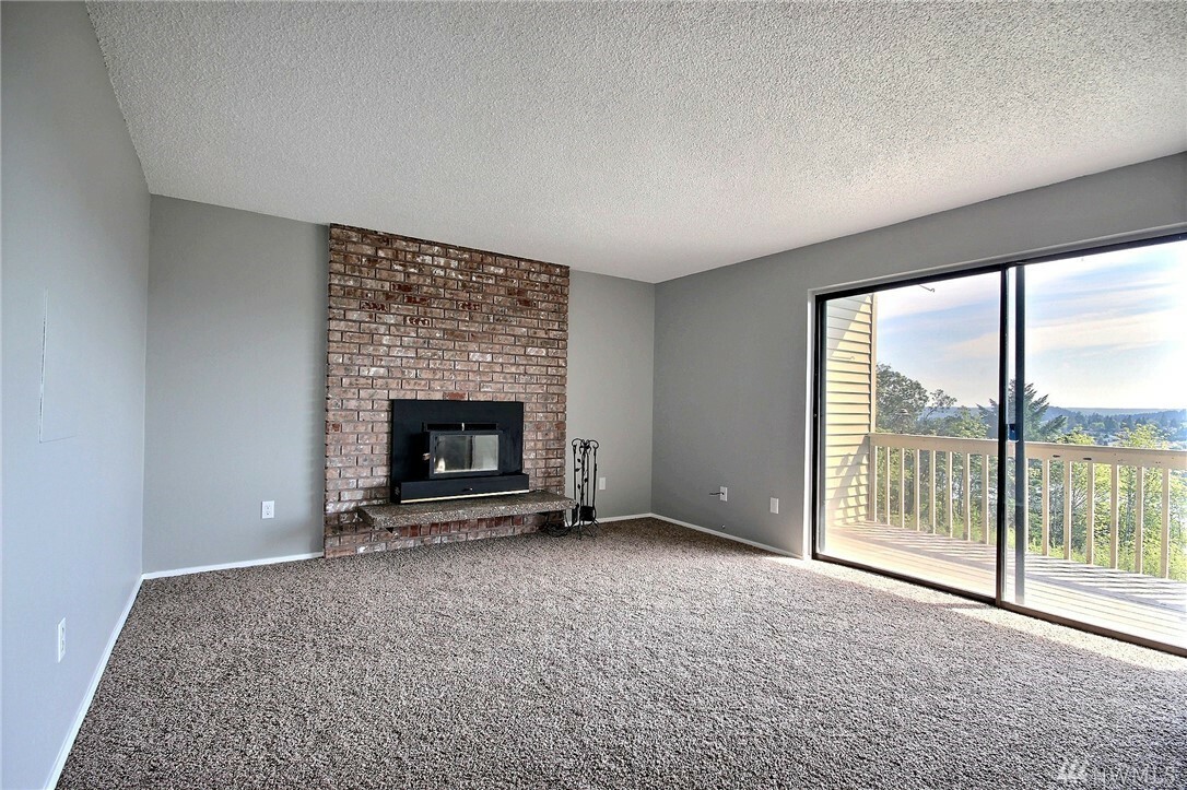 Property Photo: 3330 Narrows View Lane NE 101 WA 98310