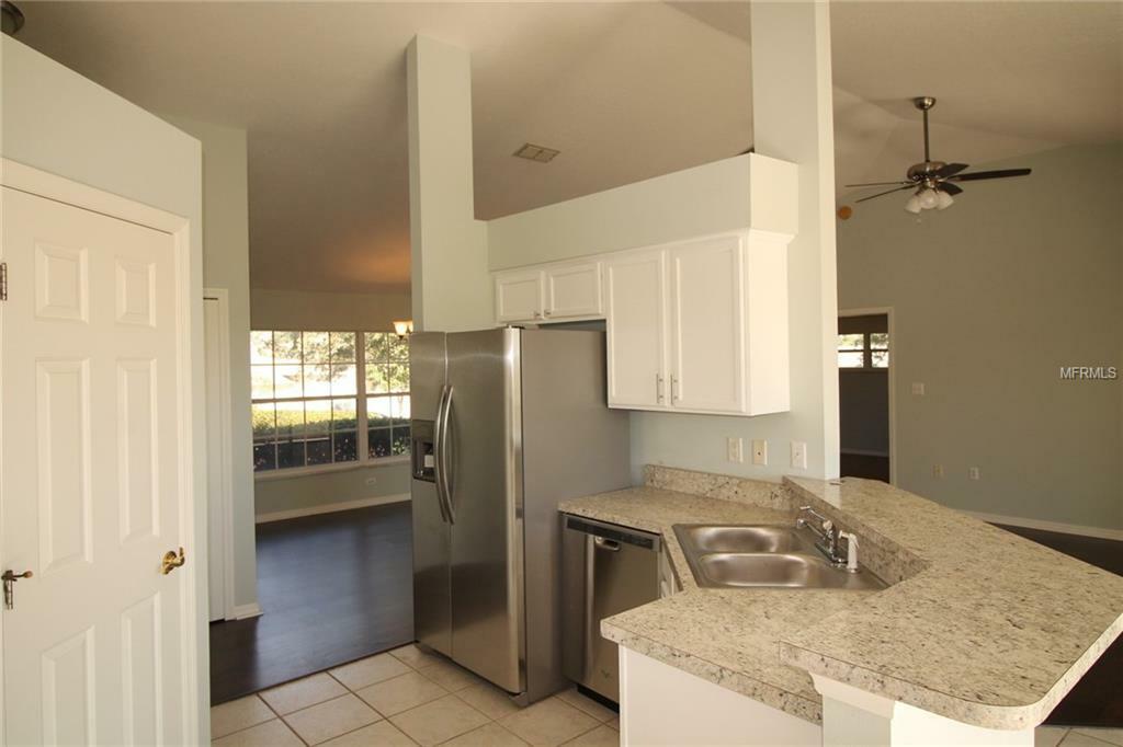 Property Photo:  8720 Spyglass Loop  FL 34711 