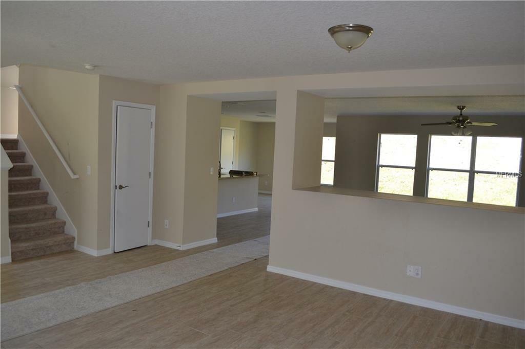 Property Photo:  1552 Setting Sun Court  FL 34711 