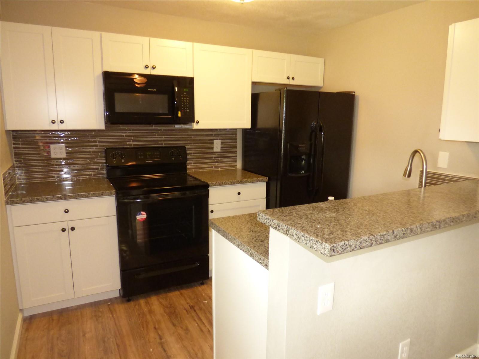 Property Photo: 1282 South Uvalda Street CO 80012