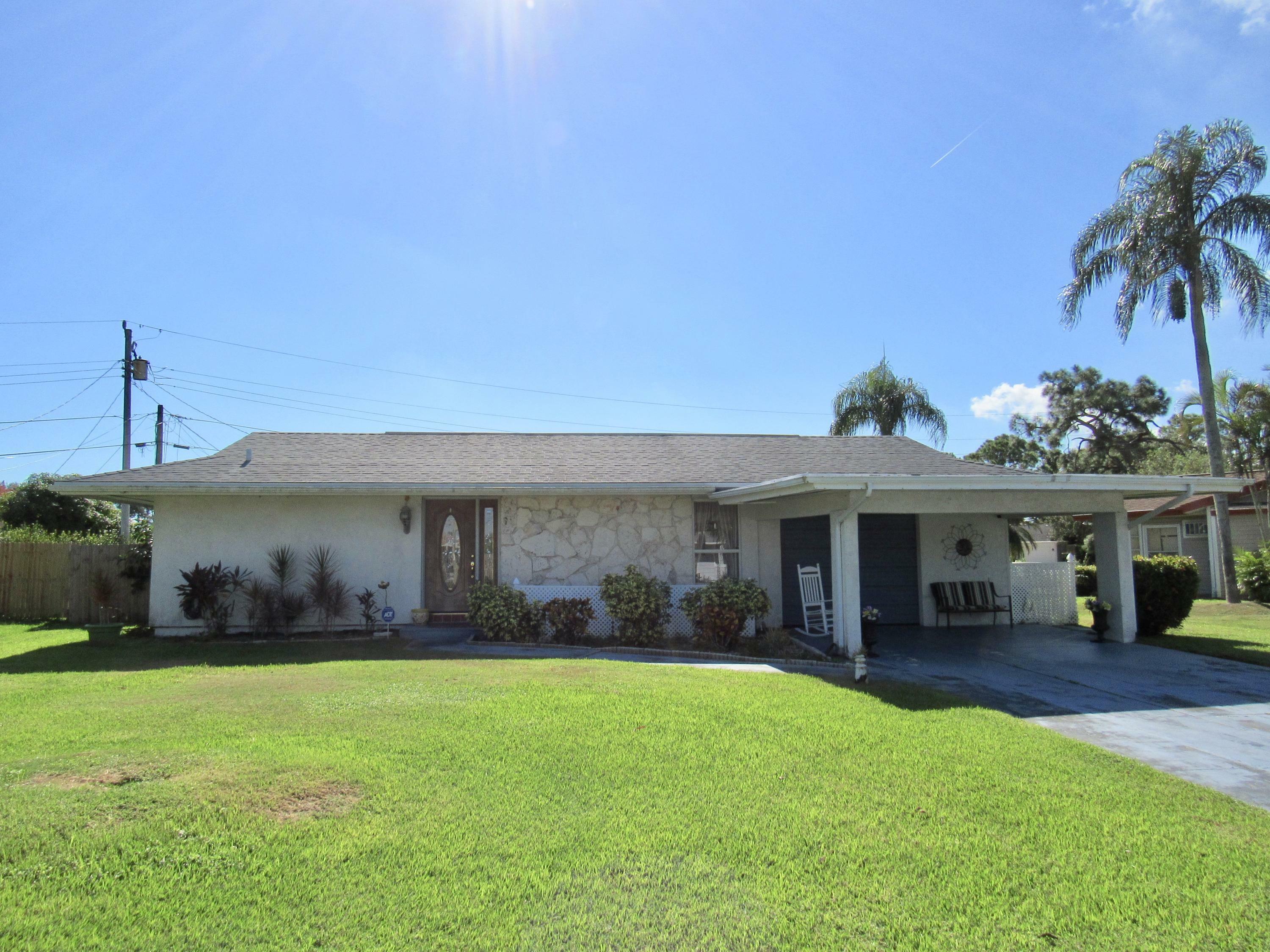 Property Photo:  117 SE Camino Street  FL 34952 