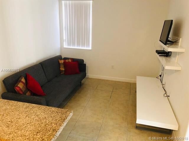 Property Photo: 10012 NW 7th St 210 FL 33172
