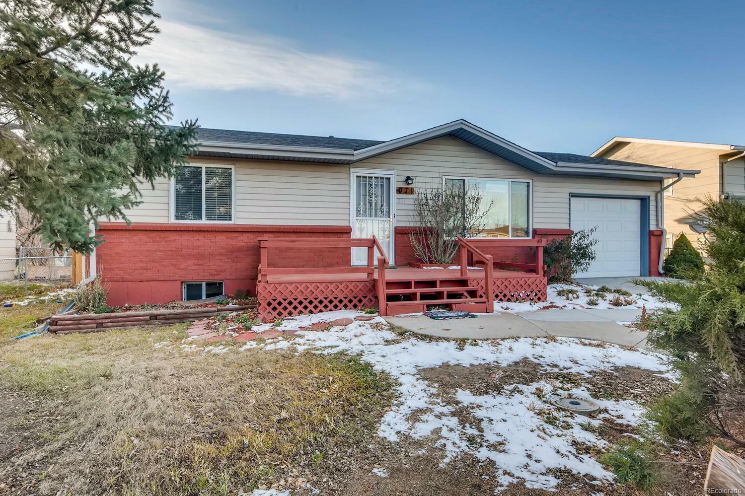 Property Photo:  971 Ouray Street  CO 80011 