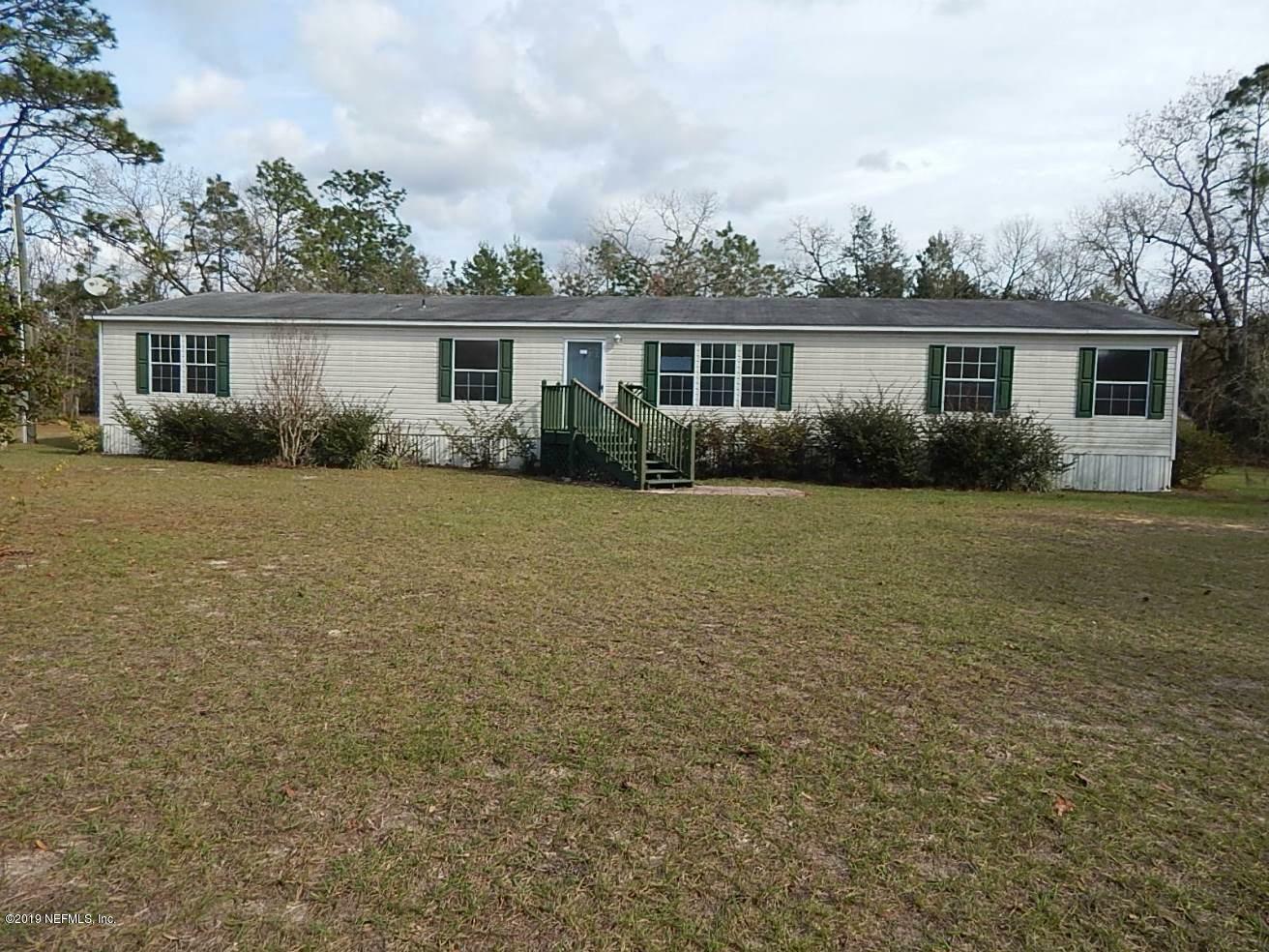 Property Photo:  116 Earl Ave  FL 32177 