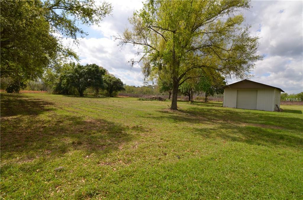 Property Photo:  7411 Groveland Farms Road  FL 34736 