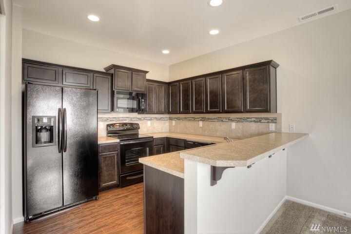 Property Photo:  204 Basil Ave 42  WA 98584 