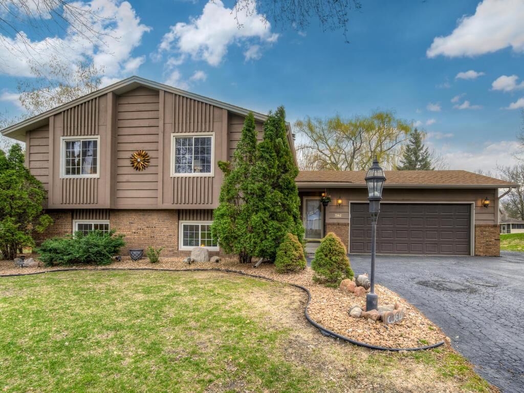 Property Photo:  7142 Polaris Lane N  MN 55311 