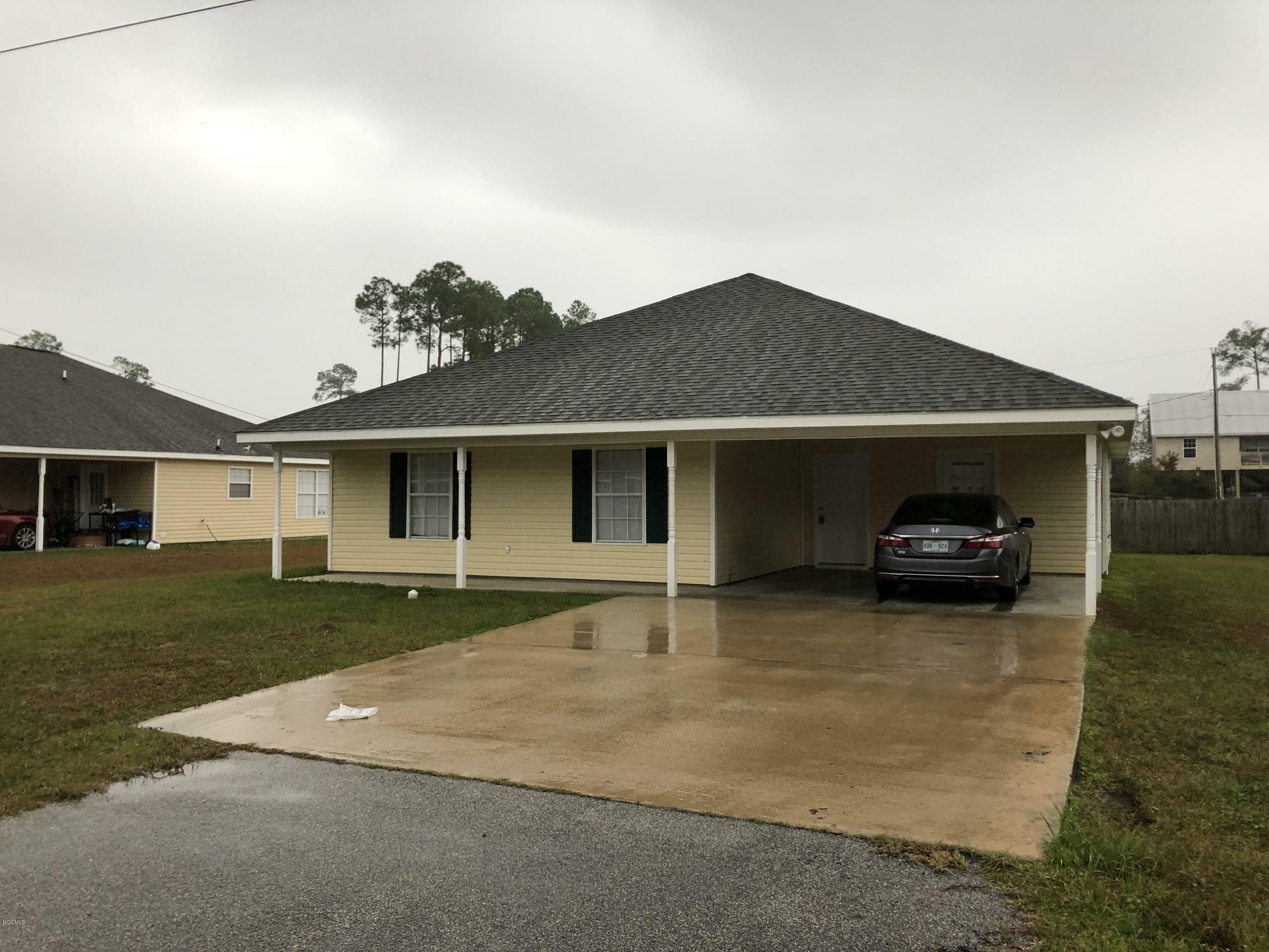 Property Photo:  211 Hibiscus Street  MS 39576 