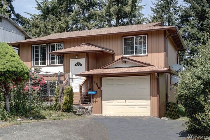 Property Photo:  1213 E 60th St  WA 98404 