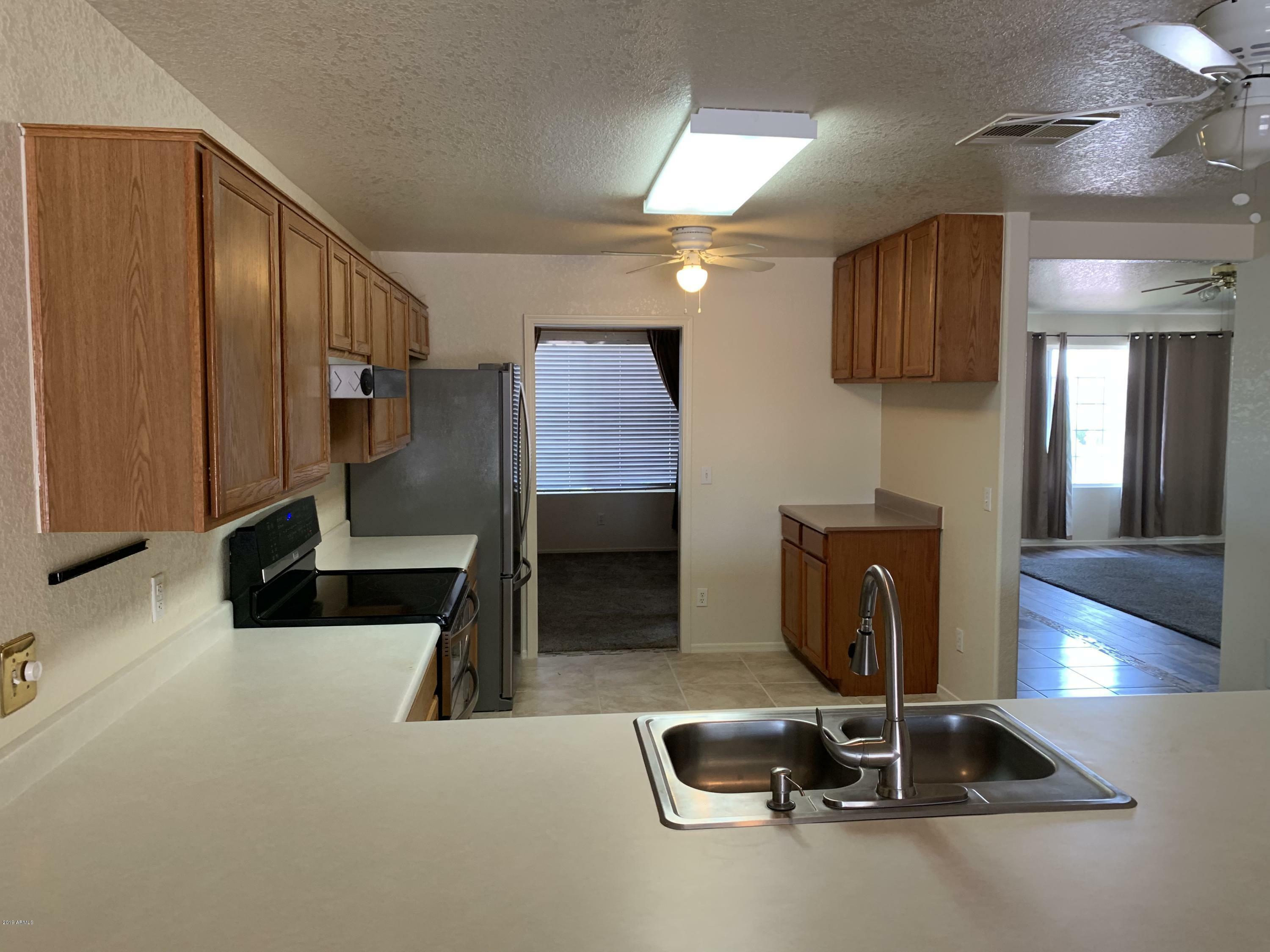 Property Photo: 18264 N 144th Avenue AZ 85374