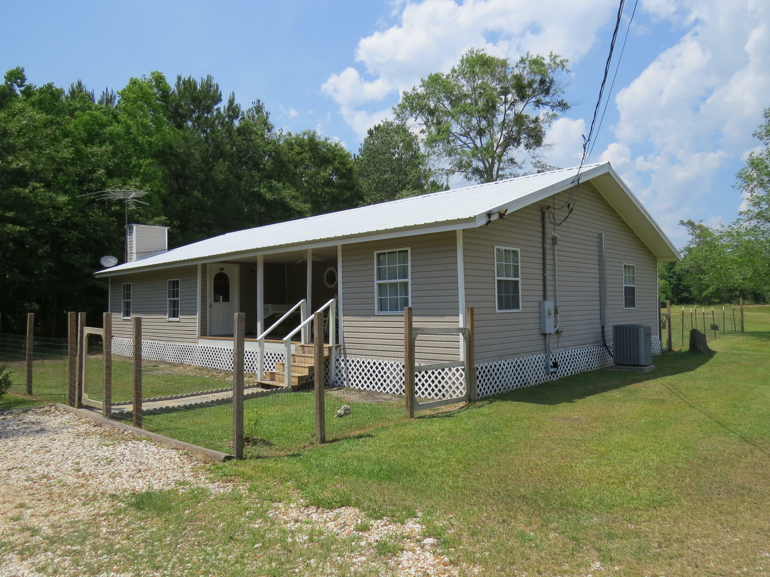 Property Photo: 19055 Roosevelt Necaise Road MS 39556