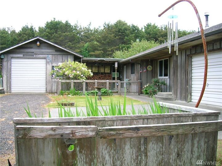 Property Photo:  205 W Wind Sand Lane  WA 98547 