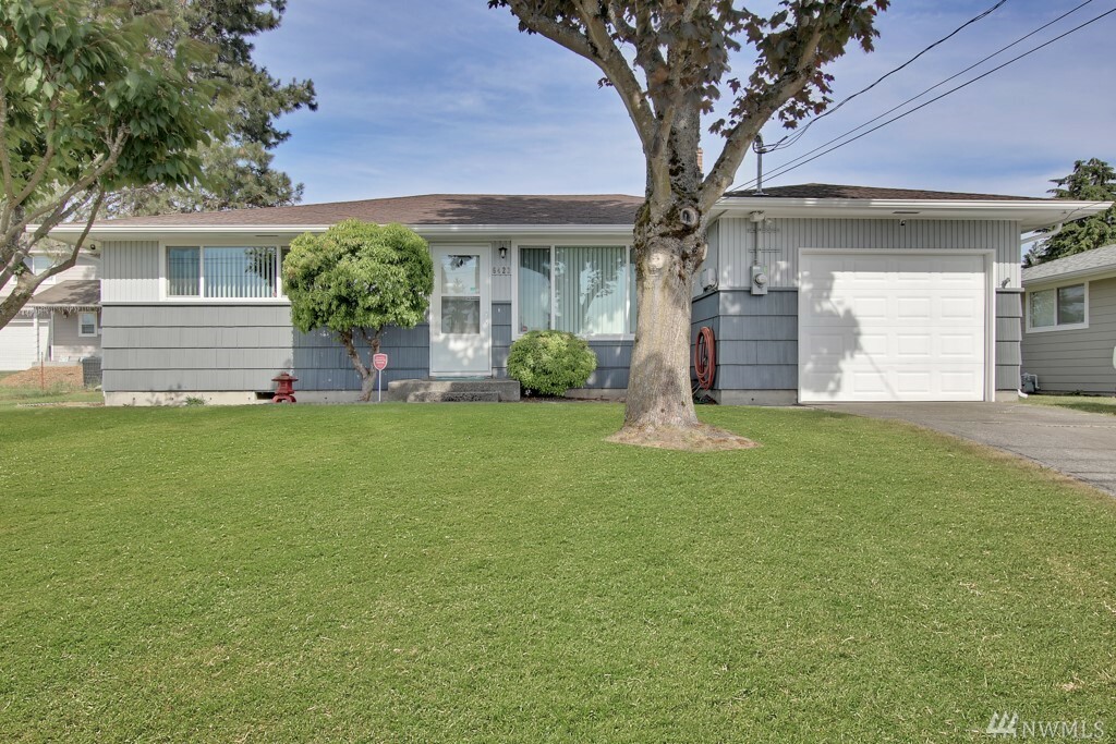 Property Photo:  6423 S Yakima Ave  WA 98408 