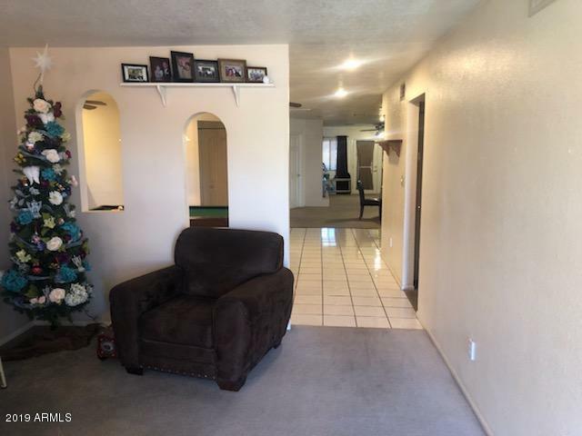 Property Photo:  9153 W Garfield Street  AZ 85353 