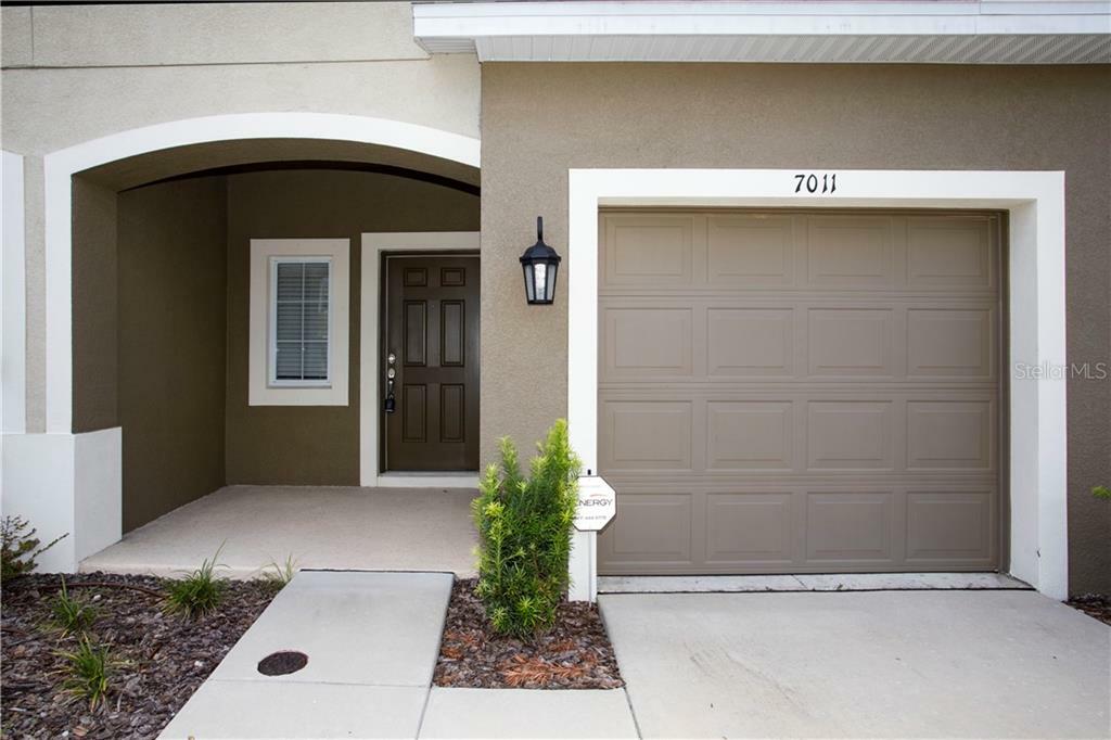 Property Photo: 7011 Woodchase Glen Drive FL 33578