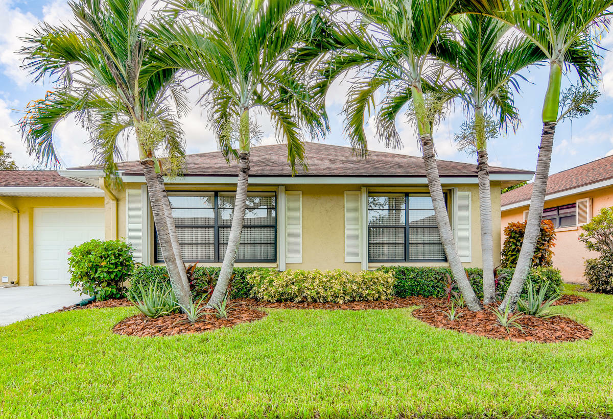 Property Photo:  9995 Orchid Tree Trail B  FL 33436 