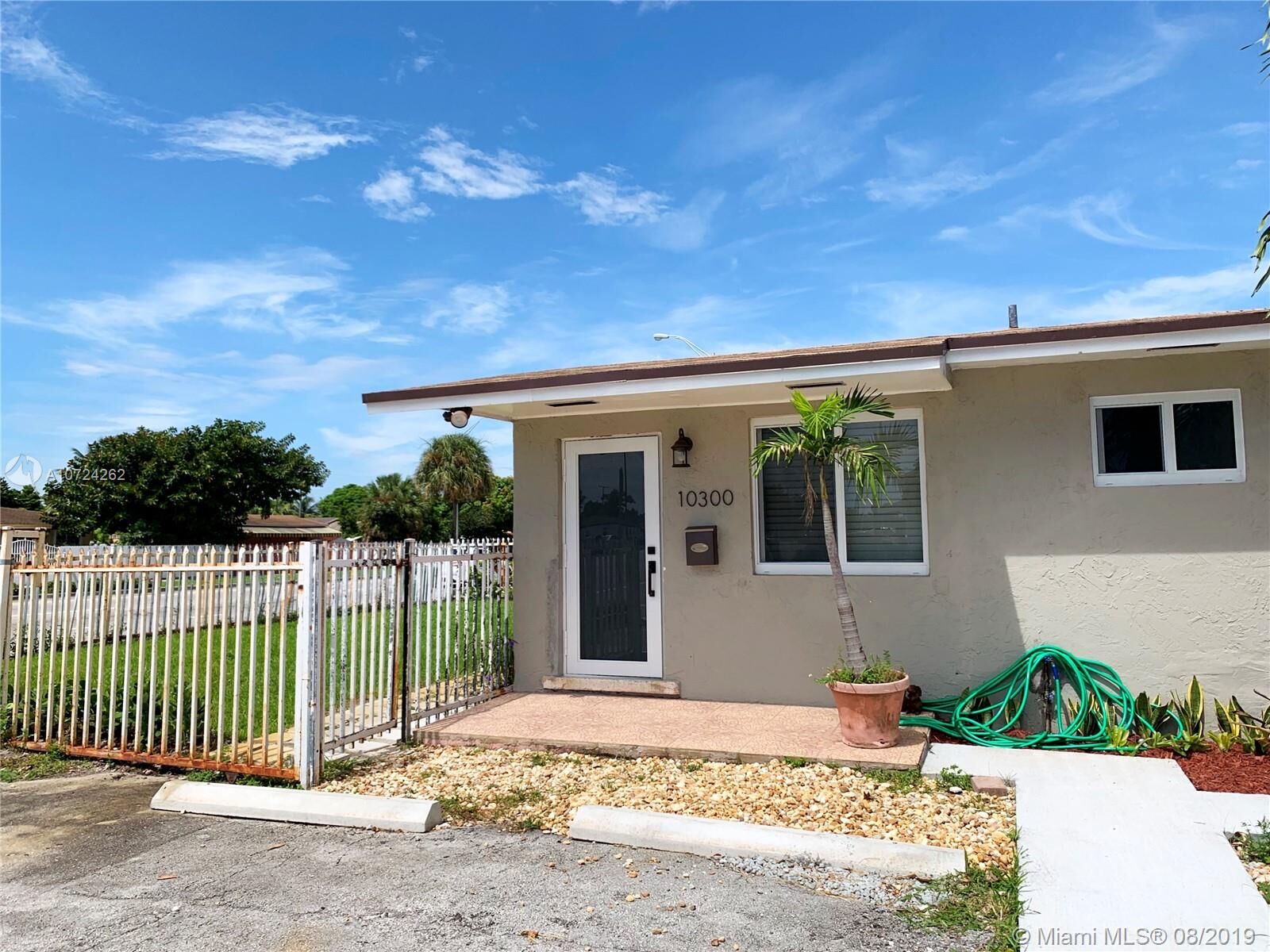 Property Photo: 10300 NW 35th Ct FL 33147