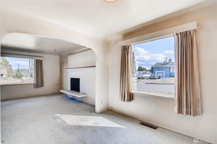 Property Photo:  7848 S Ainsworth Ave  WA 98408 