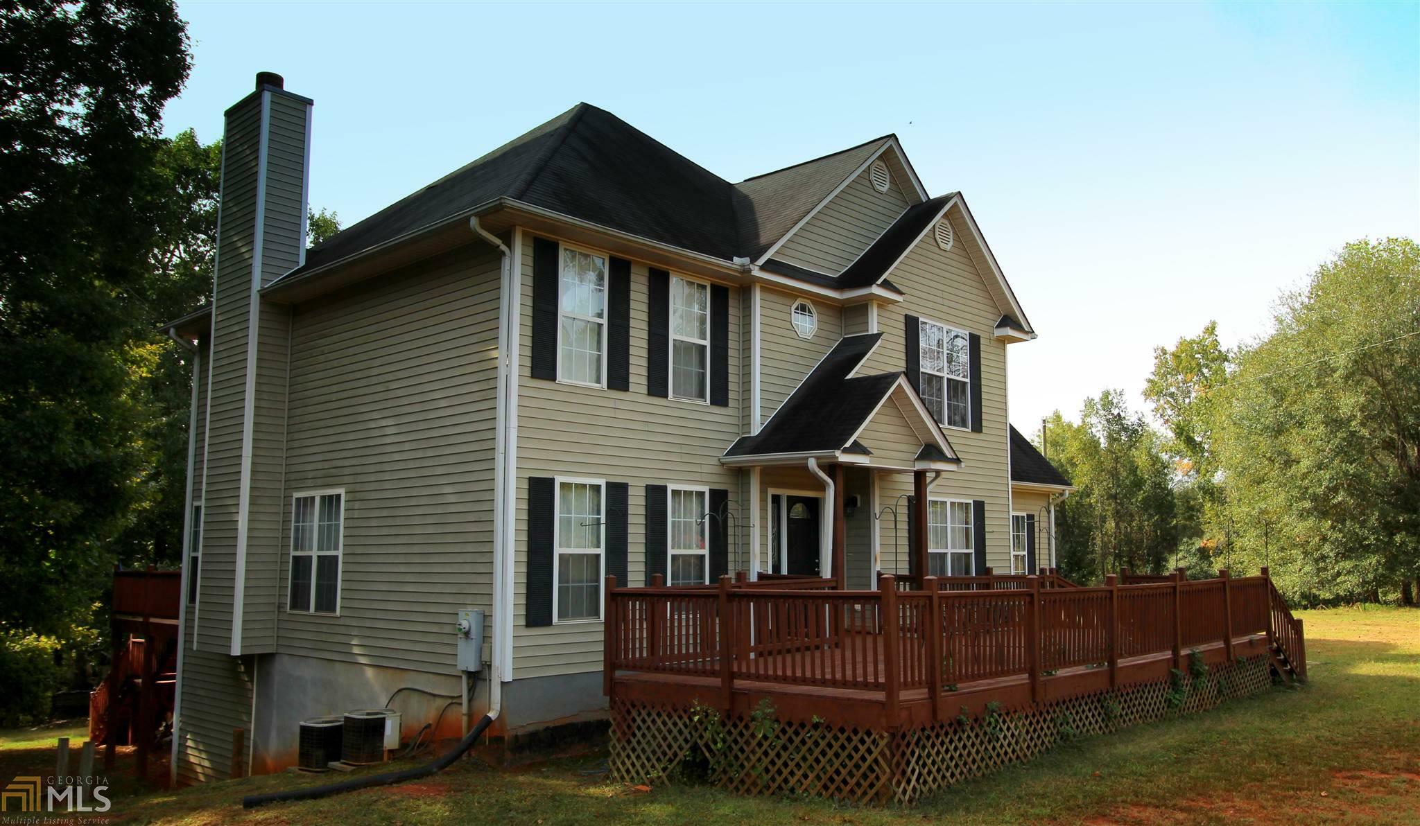 Property Photo:  1261 Pitts Chapel Rd  GA 30056 