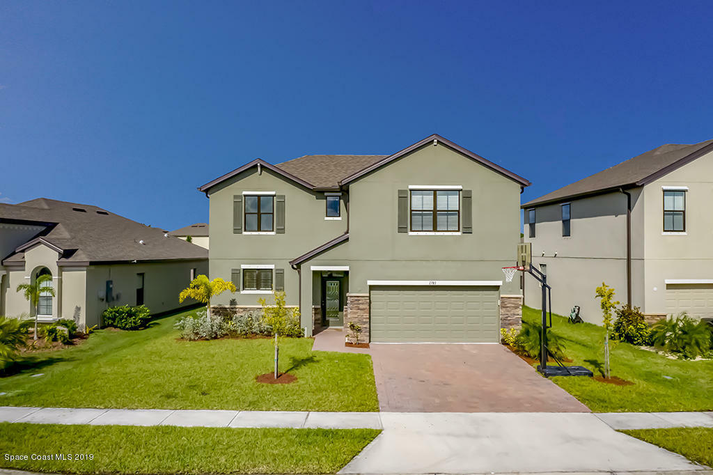 Property Photo:  1703 Musgrass Circle  FL 32904 