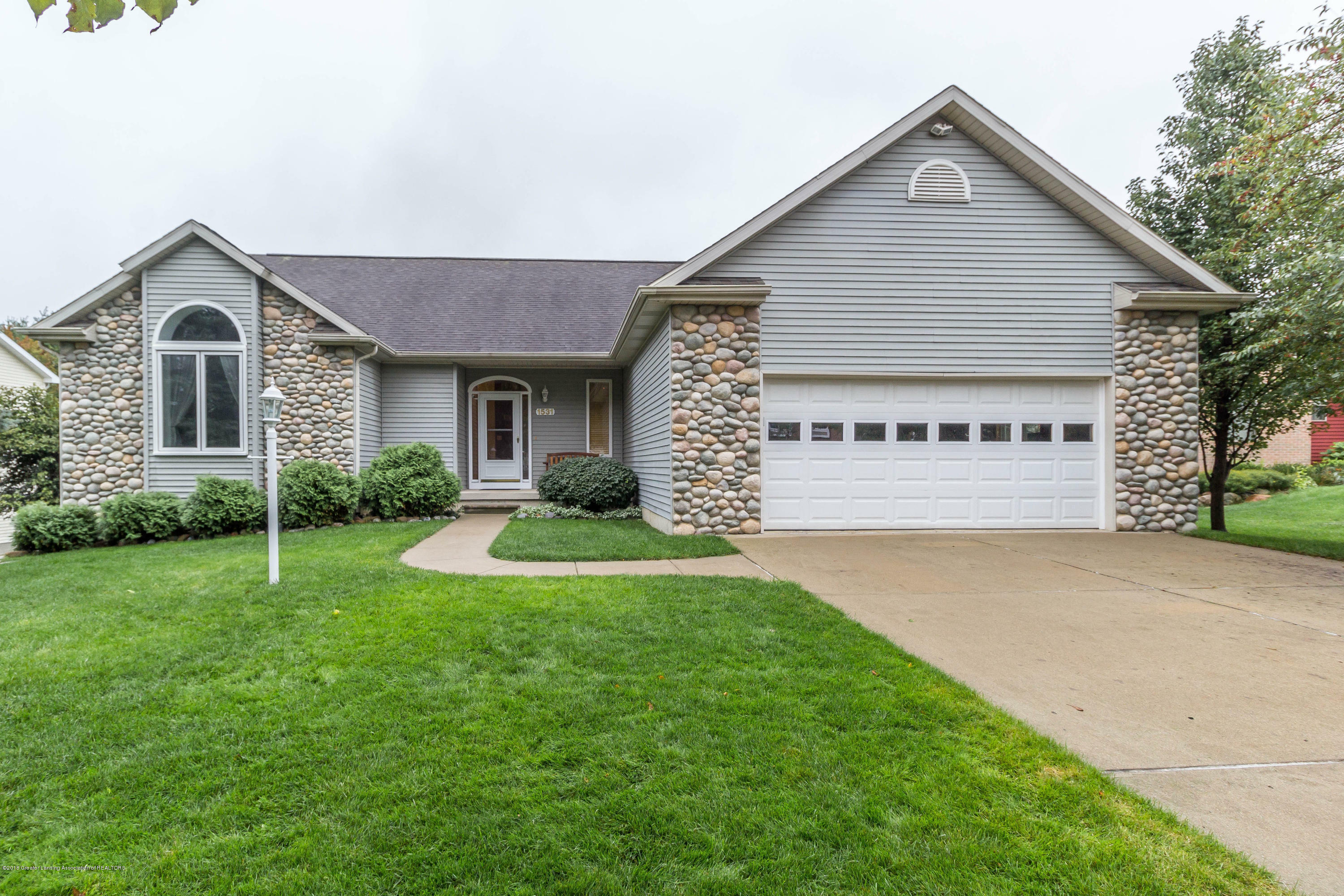 Property Photo:  1531 Picadilly Drive  MI 48840 