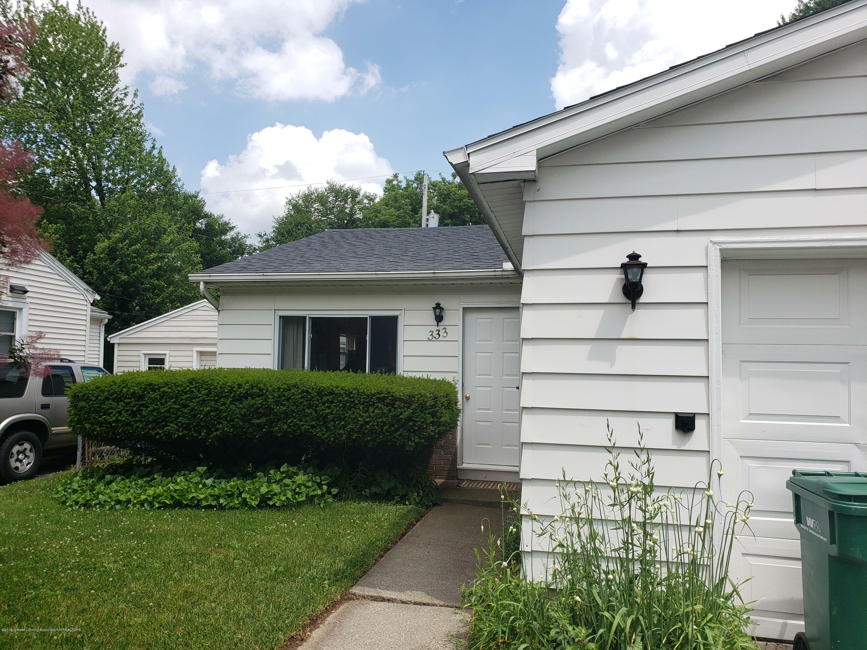 Property Photo:  333-337 Alger Street  MI 48917 