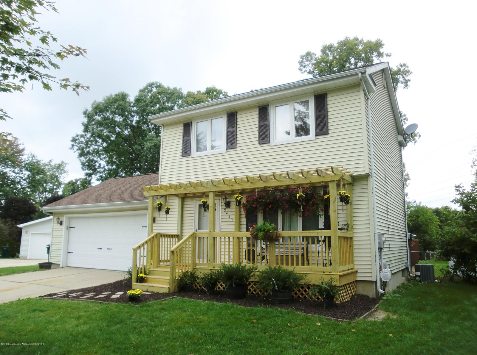 Property Photo:  5430 Faith Circle  MI 48911 